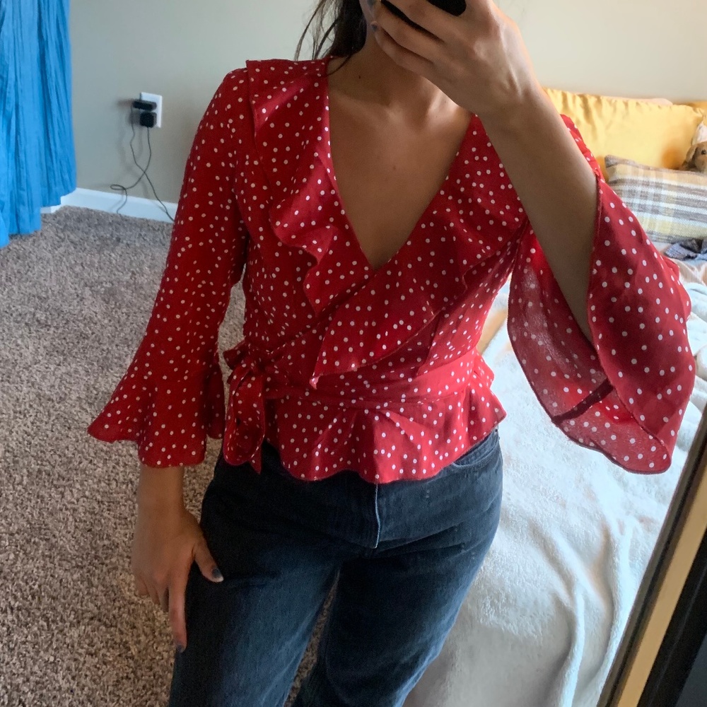 ruffled polka dot wrap blouse